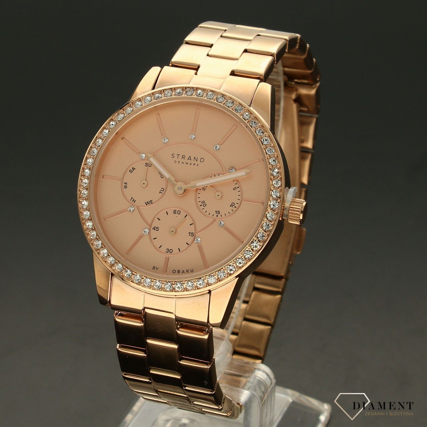 Zegarek damski STRAND Lana S707LMVVSV. Strand Lana to elegancki zegarek damski z oryginalną, różową tarczą. Tarcza ozdobiona została błyszczącymi kryształami Swarovskiego. Zegarek damski posiada indeksy w formie bły8.jpg