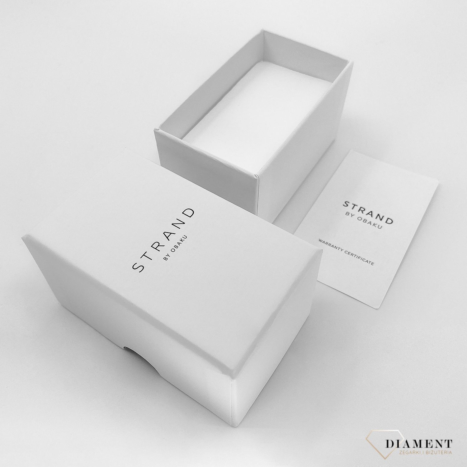 Zegarek damski STRAND Pacifica S712LXCISC. Strand Pacifica to elegancki zegarek damski z oryginalną, białą tarczą ozdobioną kwiatowym motywem. Zegarek damski posiada indeksy ze srebra. Tarcza ozdobiona jest błyszczą8.jpg