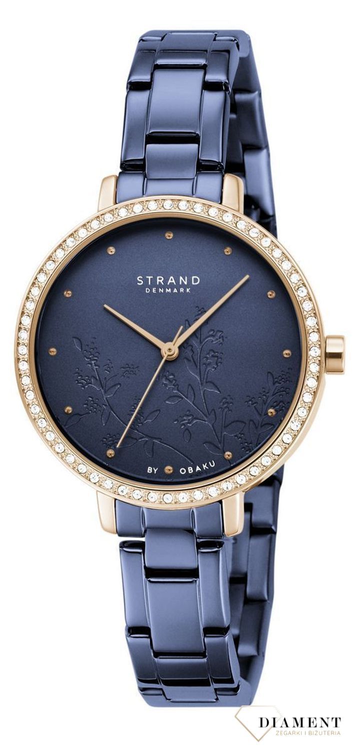 Zegarek damski STRAND Pacifica S712LXVLSL. Strand Pacifica to elegancki zegarek damski z oryginalną, granatową tarczą, ozdobioną motywem kwiatowym. Zegarek damski posiada indeksy z różowego złota. Tarcza ozdobiona j8.jpg
