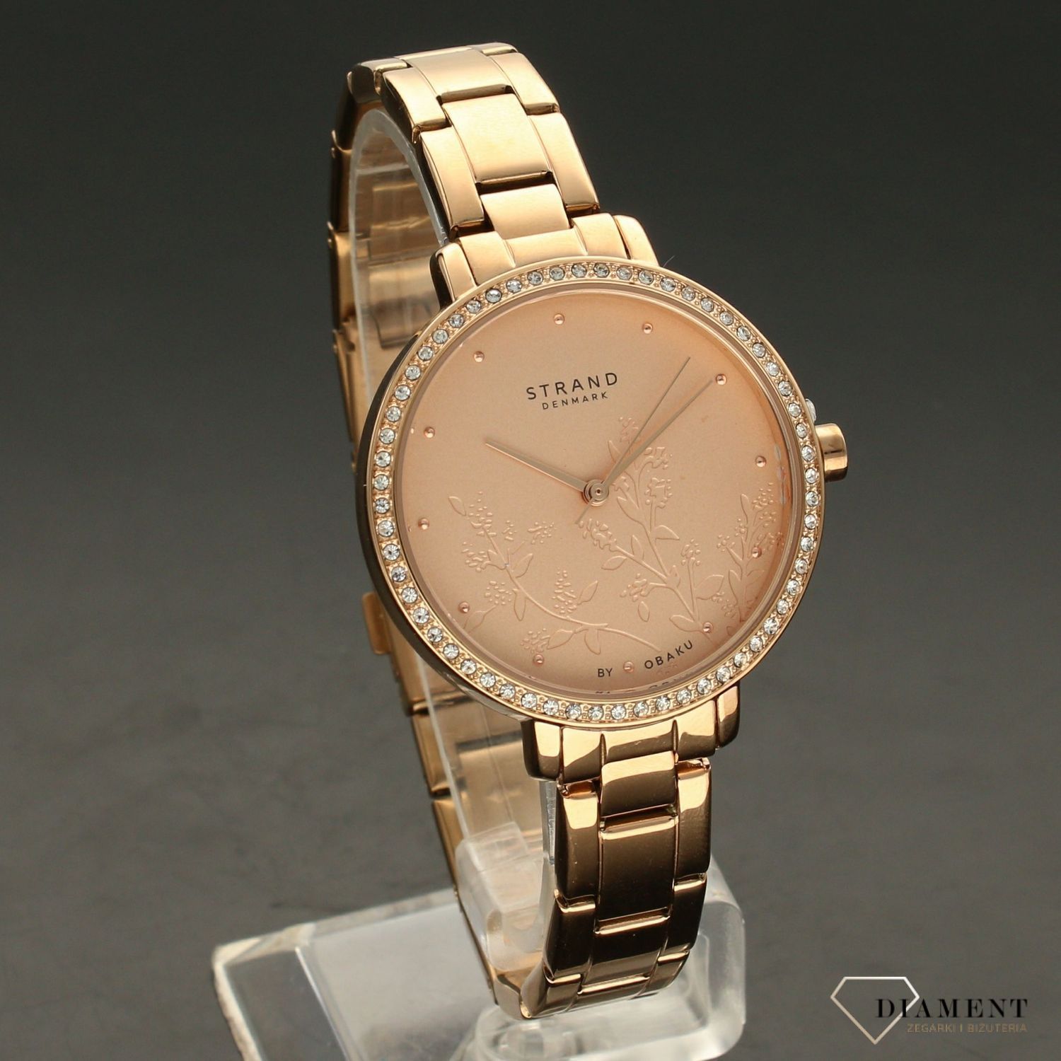 Zegarek damski STRAND Pacifica S712LXVVSV . Strand Pacifica to elegancki zegarek damski z oryginalną, różową tarczą, ozdobioną kwiatowym motywem. Zegarek damski posiada indeksy z różowego złota. Tarcza ozdobiona jes8.jpg