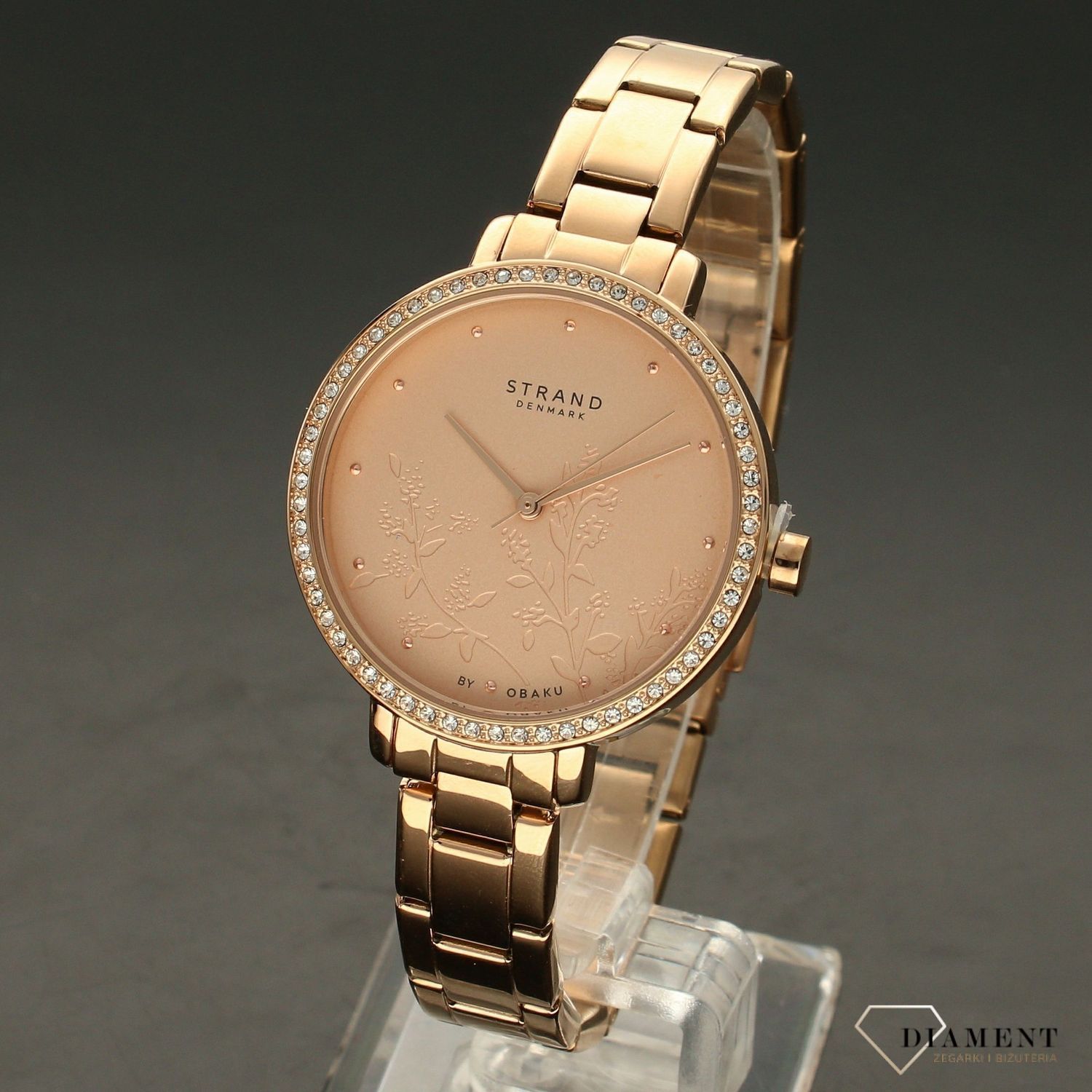 Zegarek damski STRAND Pacifica S712LXVVSV . Strand Pacifica to elegancki zegarek damski z oryginalną, różową tarczą, ozdobioną kwiatowym motywem. Zegarek damski posiada indeksy z różowego złota. Tarcza ozdobiona jes8.jpg
