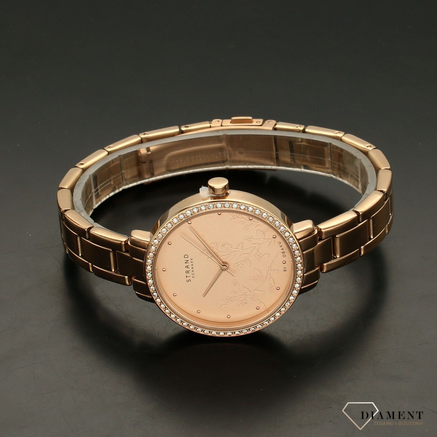 Zegarek damski STRAND Pacifica S712LXVVSV . Strand Pacifica to elegancki zegarek damski z oryginalną, różową tarczą, ozdobioną kwiatowym motywem. Zegarek damski posiada indeksy z różowego złota. Tarcza ozdobiona jes8.jpg