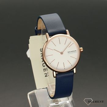 Zegarek o klasycznym wyglądzie ze stylowym paskiem skórzanym w kolorze granatowym z pasującą do całości białą tarczą. Idealny pomysł na prezent dla kobiety.  (1).jpg