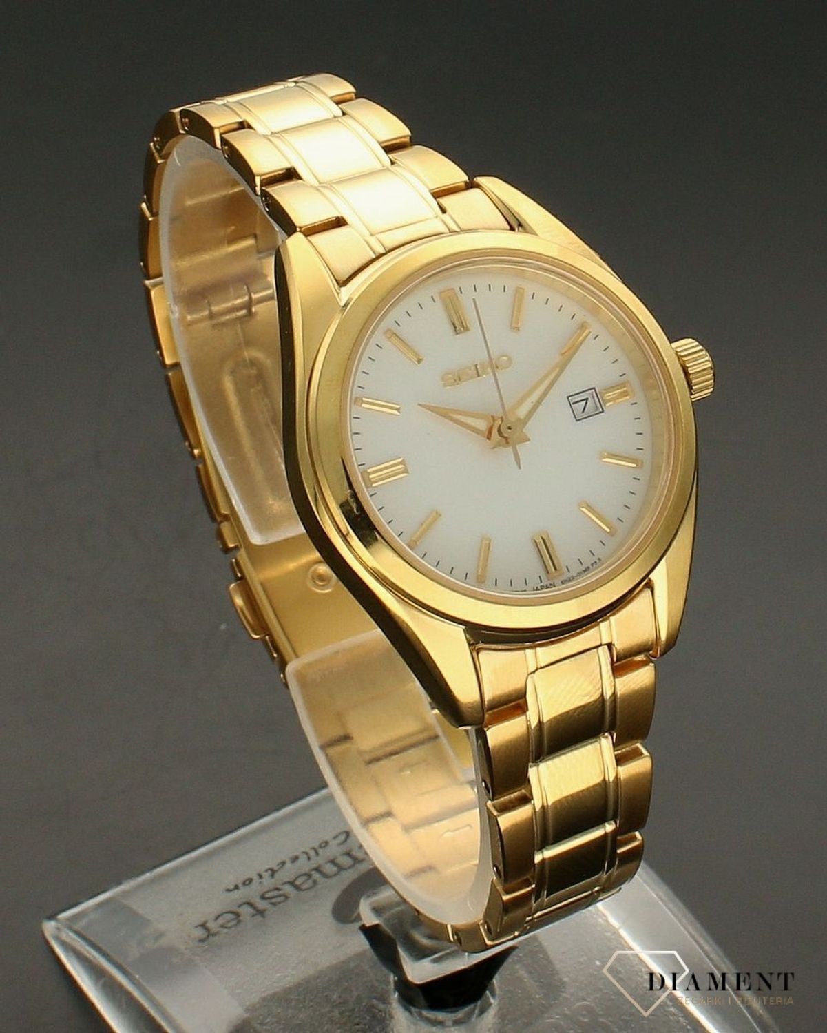 Zegarek damski Seiko SUR632P1 Classic. Zegarek damski Seiko. Zegarek damski na bransolecie. Zegarek w złotym kolorze. Zegarek damski z indeksami. Zegarek damski z białą tarcza. Zegarek damski Seiko.jpg