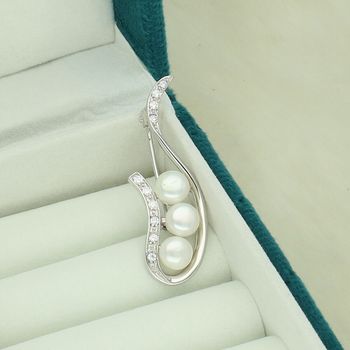 Broszka srebrna 925 z perłami i cyrkonią – falisty kształt  SVLD0011XD2P100 Ag.jpg