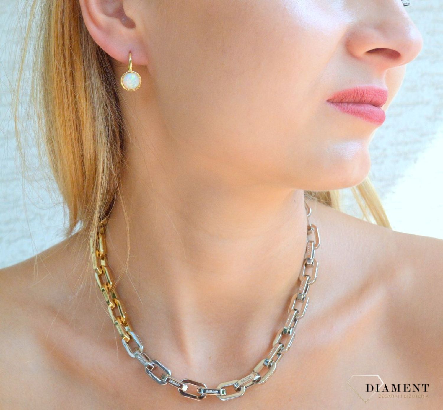 Srebrne kolczyki damskie z opalem pokryte złotem SVLE0697XH2OG00. Srebrne kolczyki z kamieniem. Srebrne kolczyki z opalem. Srebrne kolczyki pozłacane. Srebrne kolczyki wiszące idealne na prezent..jpg