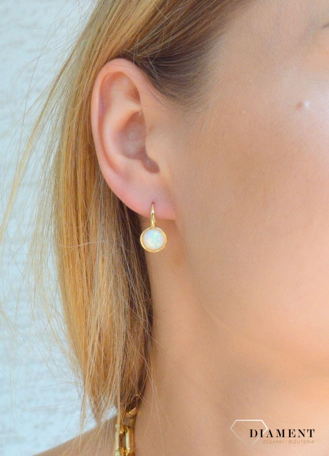 Srebrne kolczyki damskie z opalem pokryte złotem SVLE0697XH2OG00. Srebrne kolczyki z kamieniem. Srebrne kolczyki z opalem. Srebrne kolczyki pozłacane. Srebrne kolczyki wiszące idealne na prezent..jpg