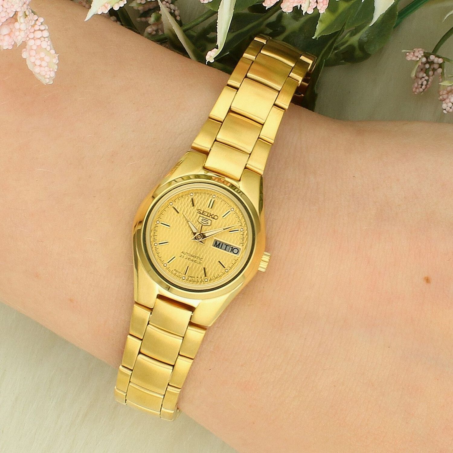 Zegarek damski Seiko 5 Sports Automatic SYMC18K1 – złoty automat z datownikiem.jpg