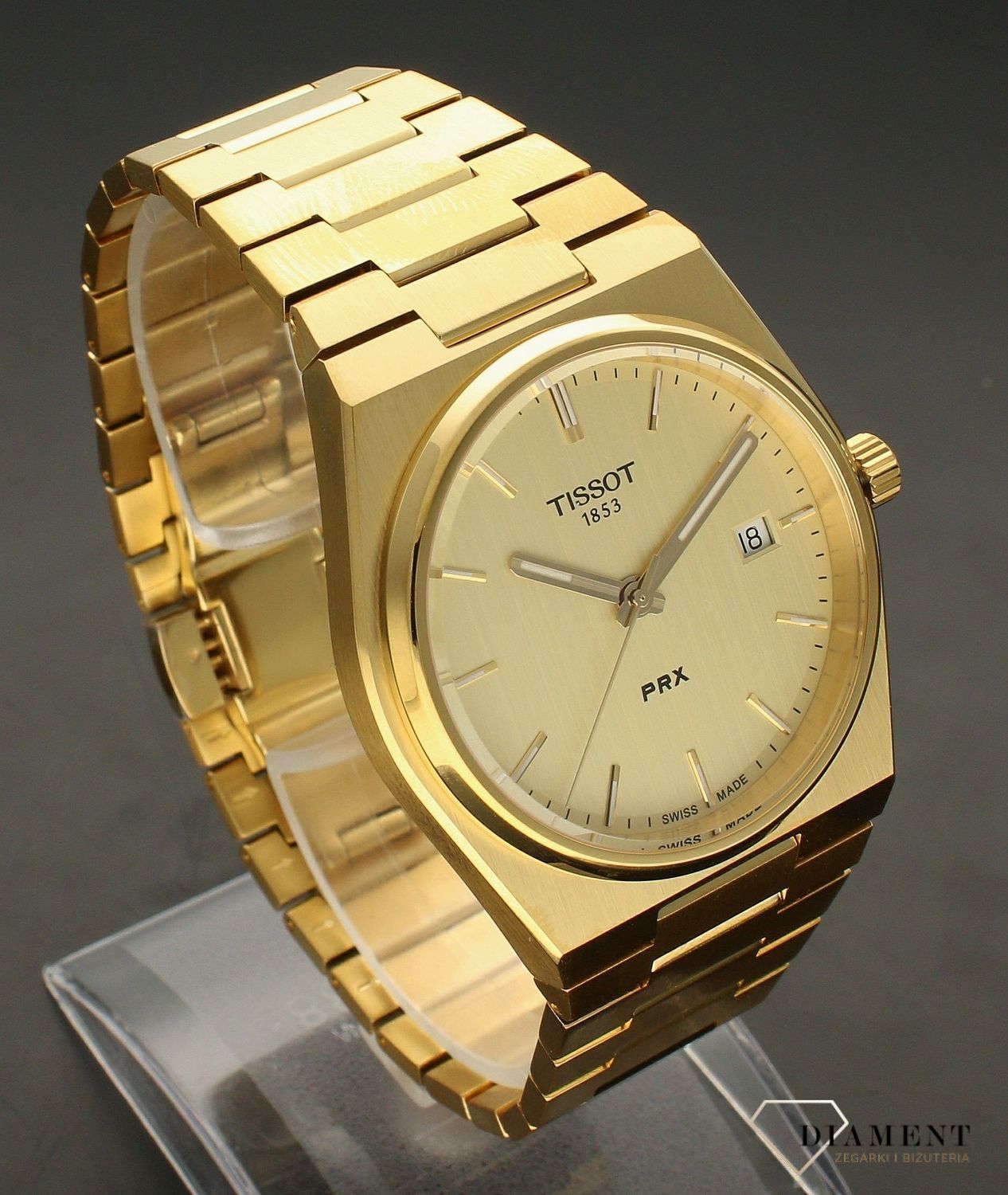 Zegarek męski Tissot PRX w złotym kolorze T137.410.33.021.00. Zegarek męski Tissot. Zegarek męski w złotym kolorze. Zegarek męski do nurkowania. Zegarek wodoszczelny. Zegarek męski elegan.jpg