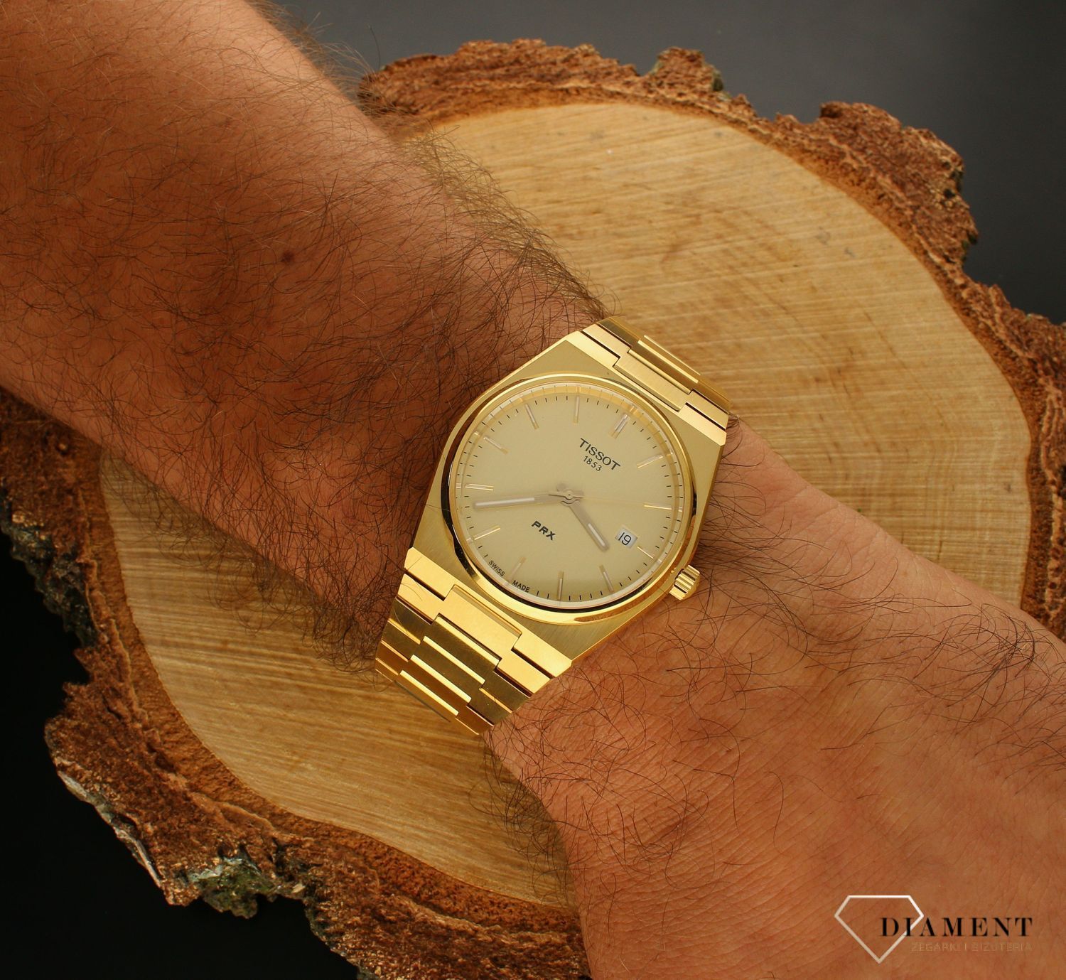 Zegarek męski Tissot PRX w złotym kolorze T137.410.33.021.00. Zegarek męski Tissot. Zegarek męski w złotym kolorze. Zegarek męski do nurkowania. Zegarek wodoszczelny. Zegarek męski elegan.jpg