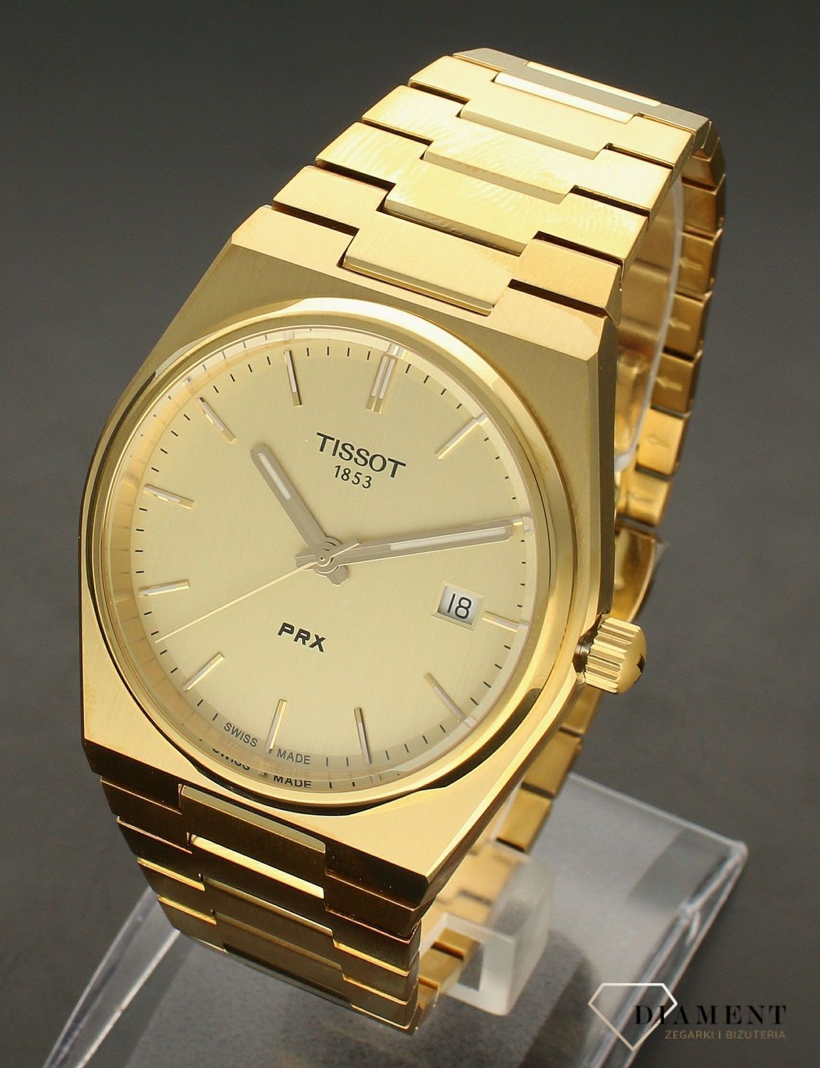 Zegarek męski Tissot PRX w złotym kolorze T137.410.33.021.00. Zegarek męski Tissot. Zegarek męski w złotym kolorze. Zegarek męski do nurkowania. Zegarek wodoszczelny. Zegarek męski elegan.jpg