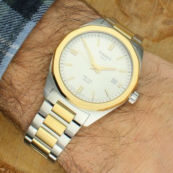 Tissot PRC 100 Solar T151.422.22.031.00 to elegancki zegarek męski 39 mm z mechanizmem solarnym, dwukolorową stalową kopertą, szafirowym szkłem, datownikiem i wodoszczelnością 100 m.2.jpg