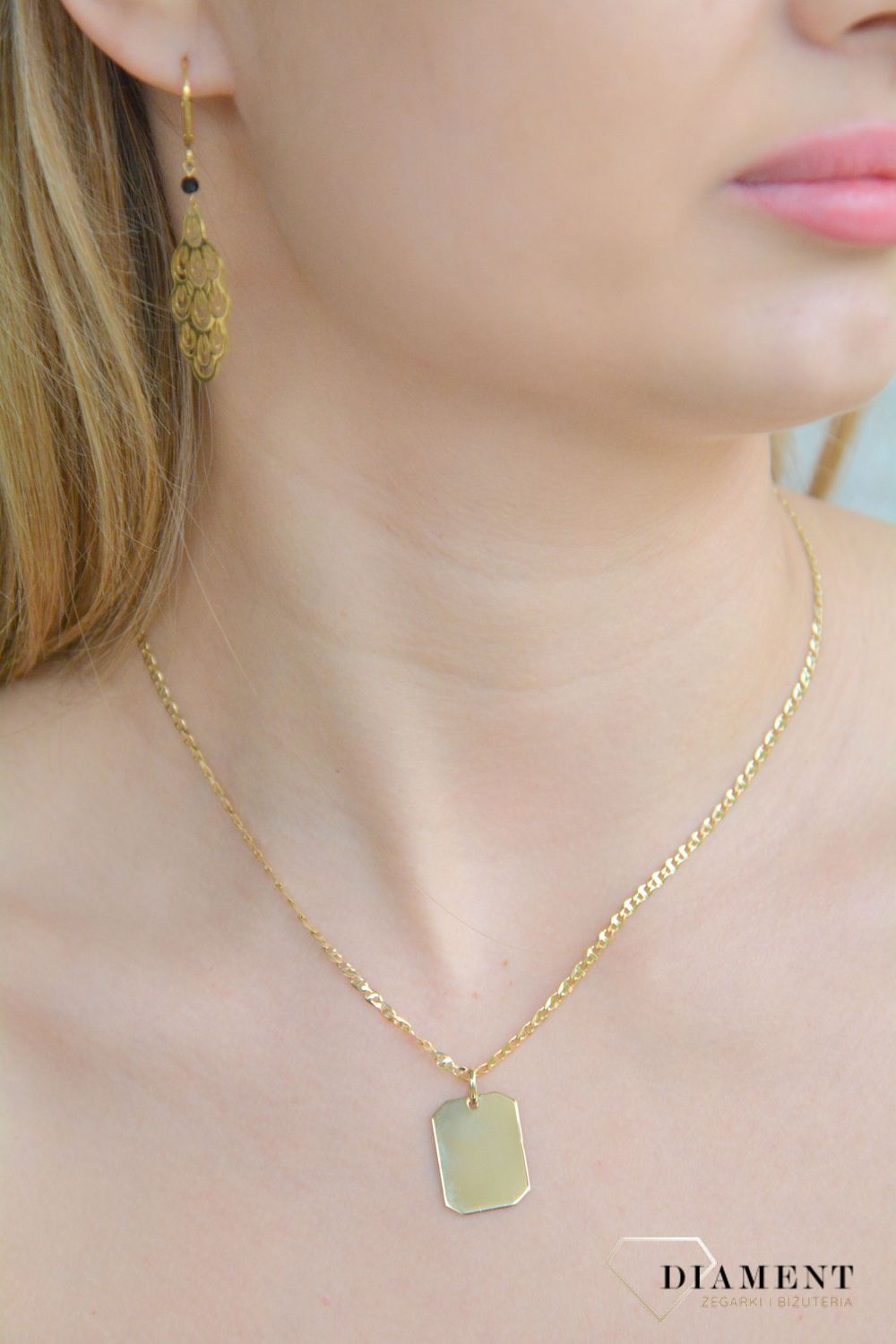 Złota zawieszka 585 gładka blaszka nieśmiertelnik T23-P-ID-5-15MM-20MM. Złota zawieszka damska. Złoty wisiorek do łańcuszka. Zawieszka Złota nieśmiertelnik do graweru. Złota zawieszka płaska blaszka na prezent..jpg