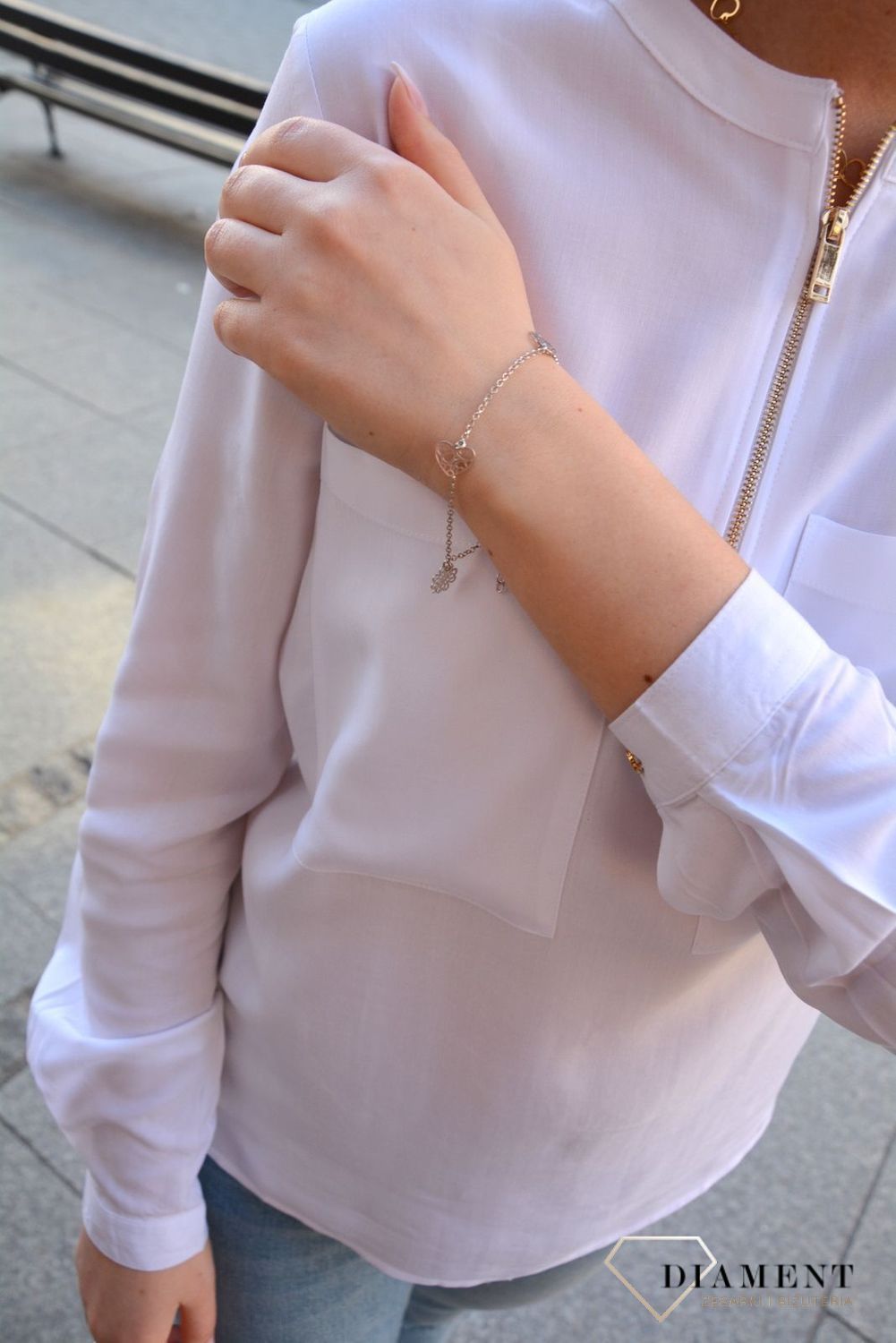 Srebrna bransoletka z wysokiej jakości srebra. Srebrna bransoletka z elementami ozdobnymi w postaci kółka, serduszka i koniczynki..jpg