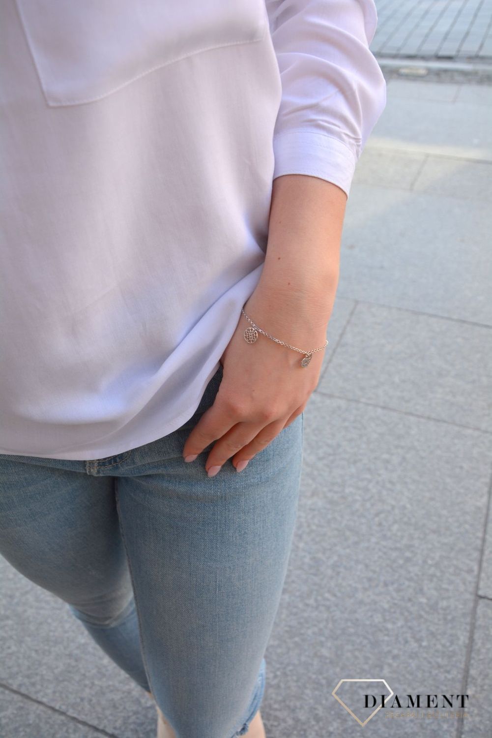 Srebrna bransoletka z wysokiej jakości srebra. Srebrna bransoletka z elementami ozdobnymi w postaci kółka, serduszka i koniczynki..jpg