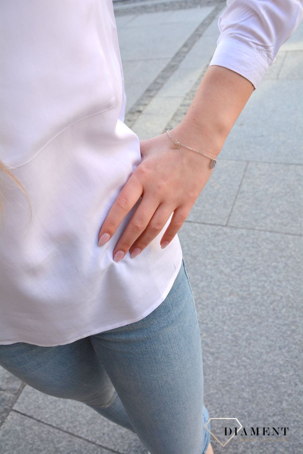 Srebrna bransoletka z wysokiej jakości srebra. Srebrna bransoletka z elementami ozdobnymi w postaci kółka, serduszka i koniczynki..jpg