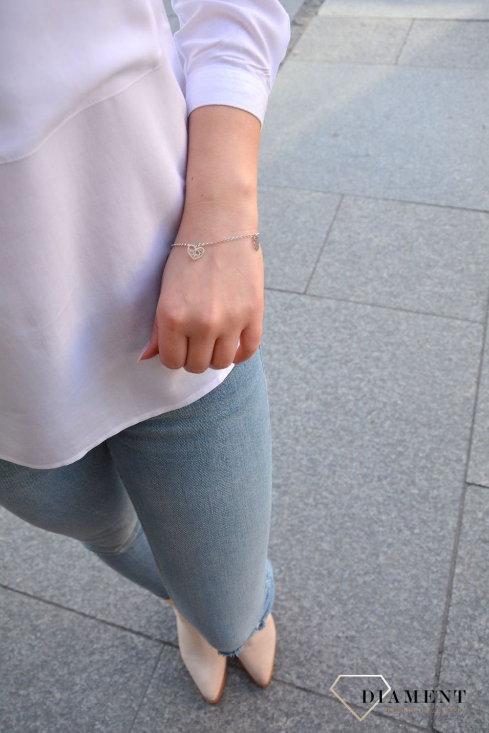 Srebrna bransoletka z wysokiej jakości srebra. Srebrna bransoletka z elementami ozdobnymi w postaci kółka, serduszka i koniczynki..jpg