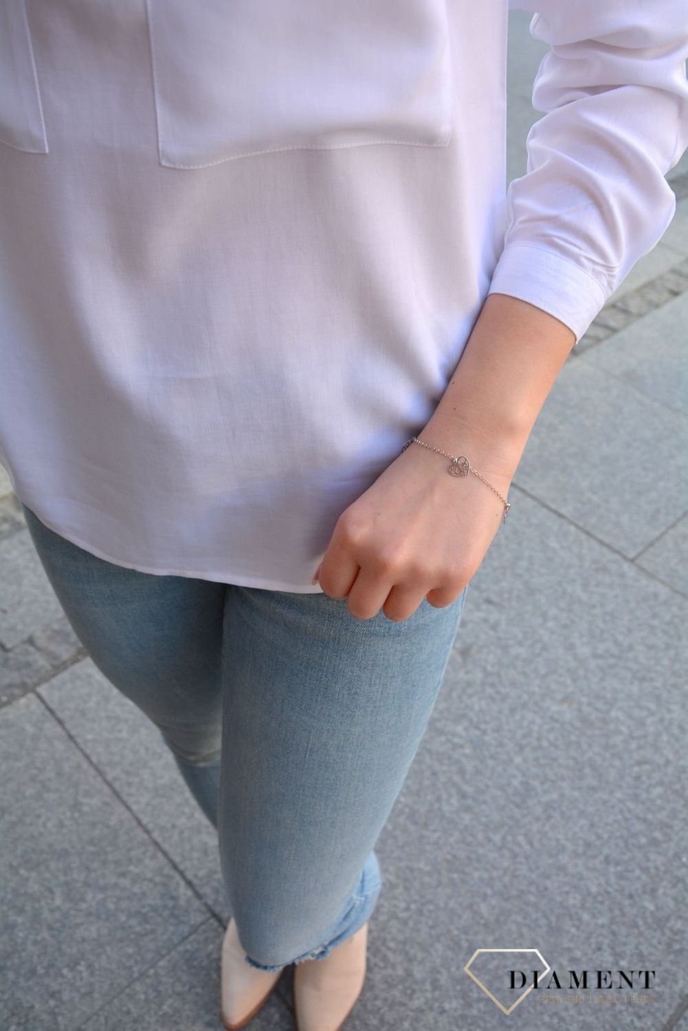 Srebrna bransoletka z wysokiej jakości srebra. Srebrna bransoletka z elementami ozdobnymi w postaci kółka, serduszka i koniczynki..jpg