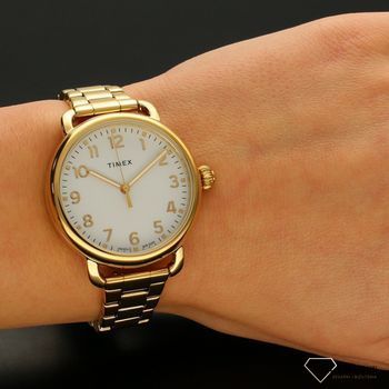 Zegarek damski Timex 'Złota klasyka' TW2U13900 ✅ Zegarek damski o okrągłej kopercie w kolorze złotym z piękną i czytelną tarczą w kolorze białym z cyframi arabskimi (1).jpg