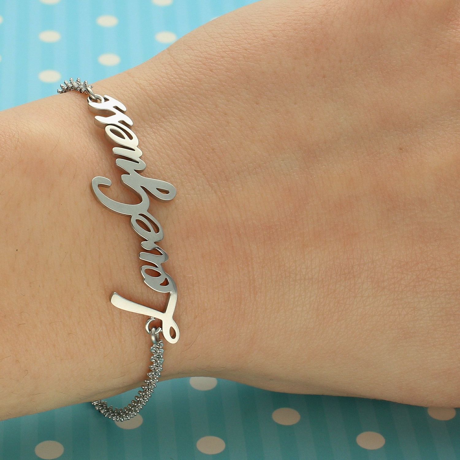 Bransoletka GUESS stalowa z napisem 'Love Guess' UBB70057-S.jpg