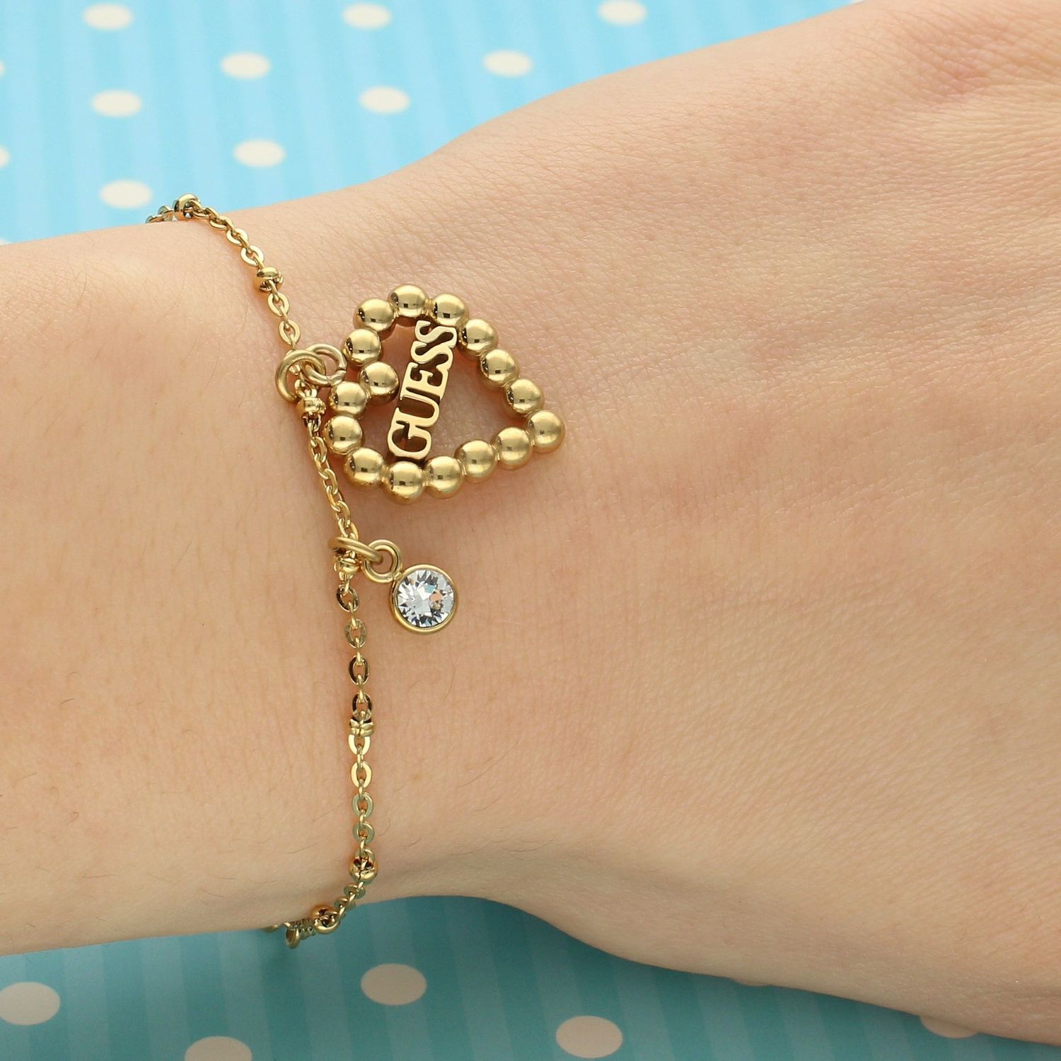 Bransoletka GUESS pozłacana z sercem i kryształem UBB70090-S.jpg