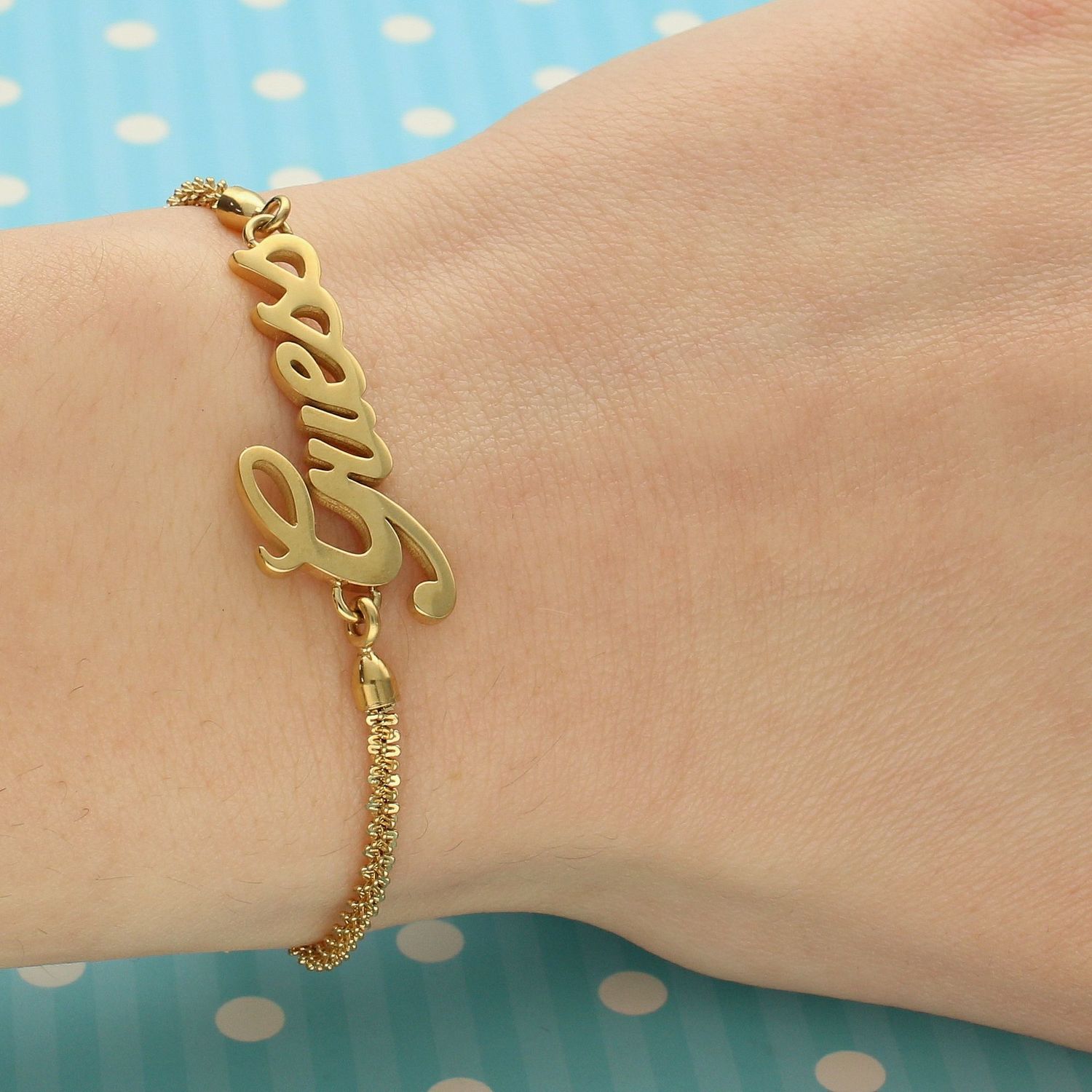 Bransoletka GUESS pozłacana z napisem 'Guess' UBB79103-S.jpg