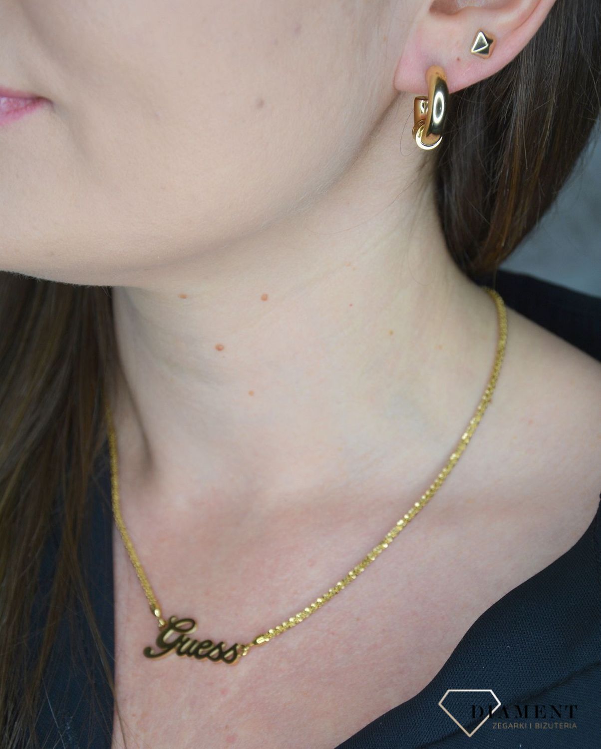 Kolczyki GUESS stalowe koła pozłacane UBE70023.jpg