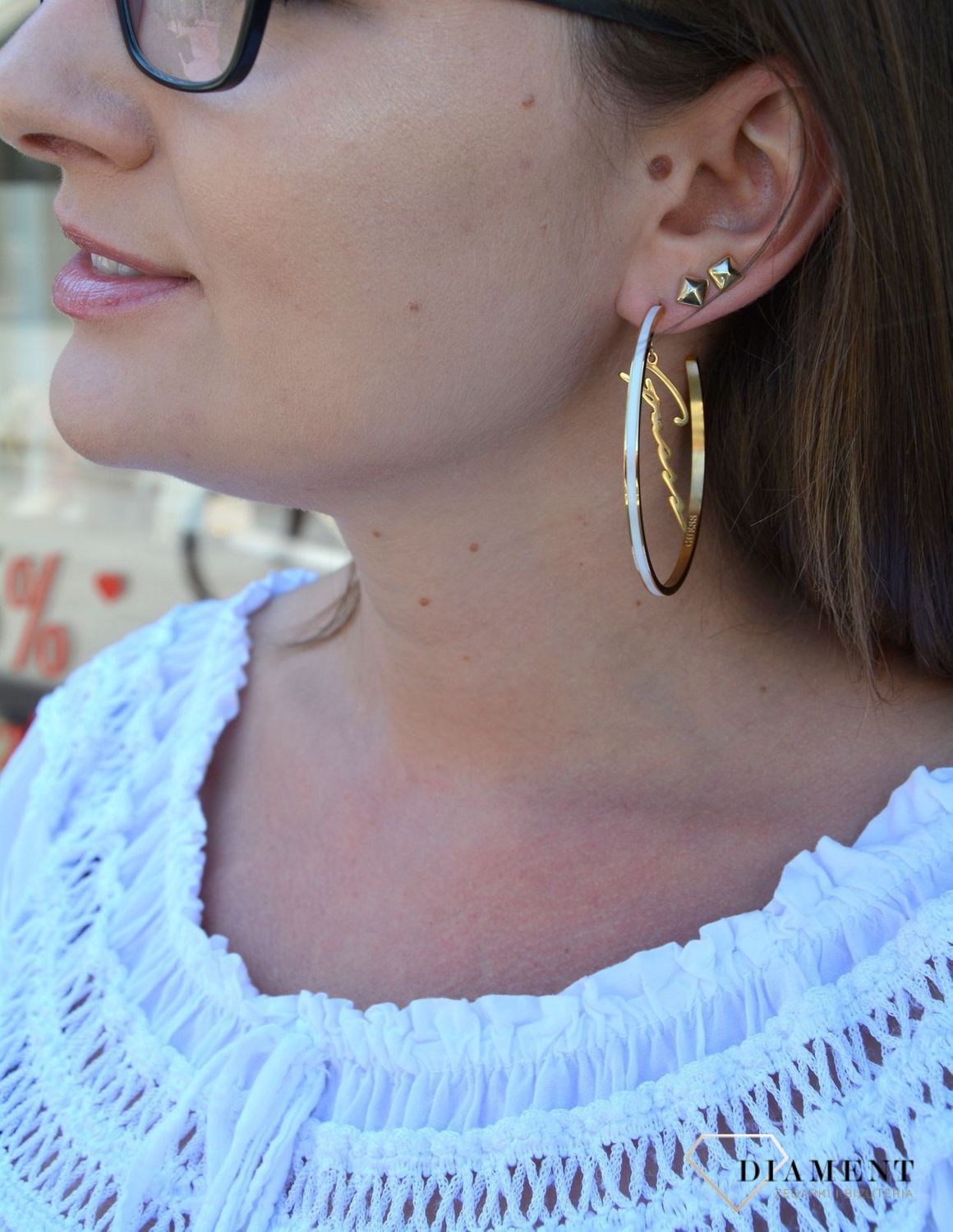 Kolczyki GUESS stalowe pozłacane duże koła z napisem Guess UBE70206.jpg