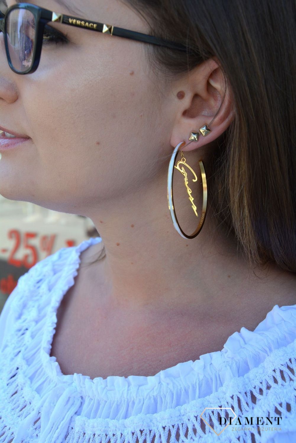 Kolczyki GUESS stalowe pozłacane duże koła z napisem Guess UBE70206.jpg