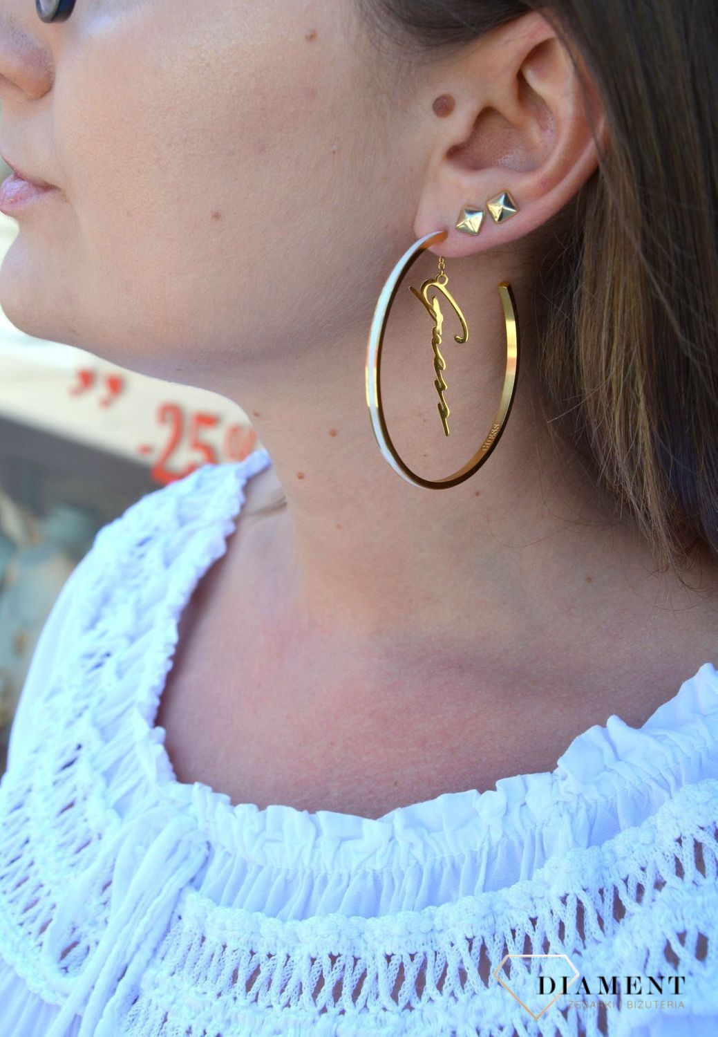 Kolczyki GUESS stalowe pozłacane duże koła z napisem Guess UBE70206.jpg