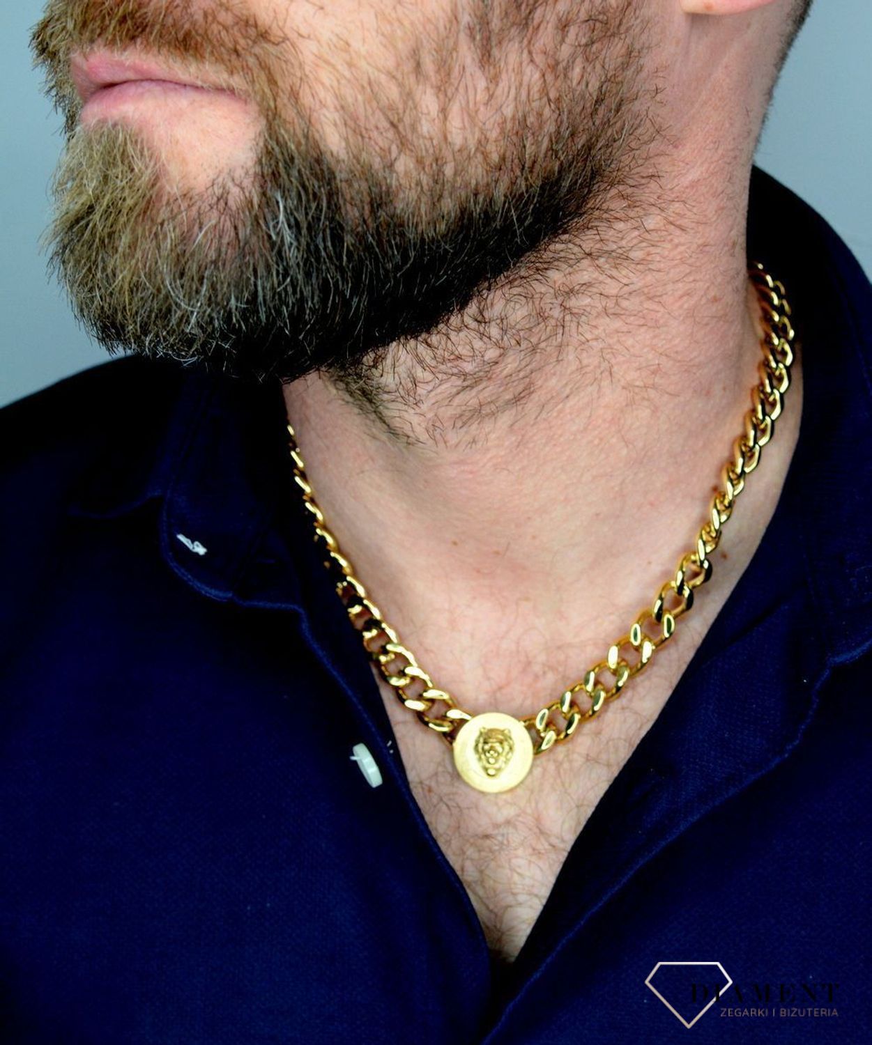 Naszyjnik męski GUESS w kolorze złotym UMN20011. Naszyjnik męski GUESS w kolorze złotym. Naszyjnik w formie złotej pancerki z logiem GUESS. .jpg