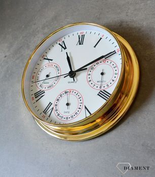 Zegar wyposażony jest w kwarcowy mechanizm, zasilany za pomocą baterii. MULTIDATA Zegar złoty mały z kalendarzem rozmieszczonym na trzech małych tarczach.  (1).JPG
