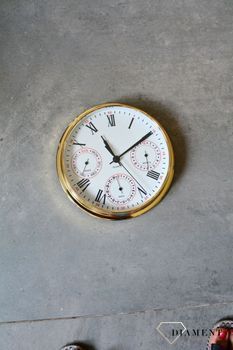 Zegar wyposażony jest w kwarcowy mechanizm, zasilany za pomocą baterii. MULTIDATA Zegar złoty mały z kalendarzem rozmieszczonym na trzech małych tarczach.  (6).JPG