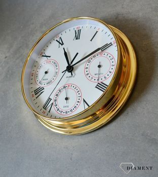 Zegar wyposażony jest w kwarcowy mechanizm, zasilany za pomocą baterii. MULTIDATA Zegar złoty mały z kalendarzem rozmieszczonym na trzech małych tarczach.  (9).JPG