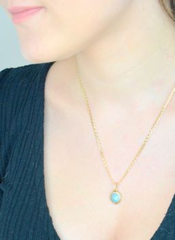 Złota zawieszka topaz w złotej oprawie z cyrkoniami Z1AGPO6950414. Wisiorek został wykonany z wysokiej jakości złota próby 585 (4).JPG