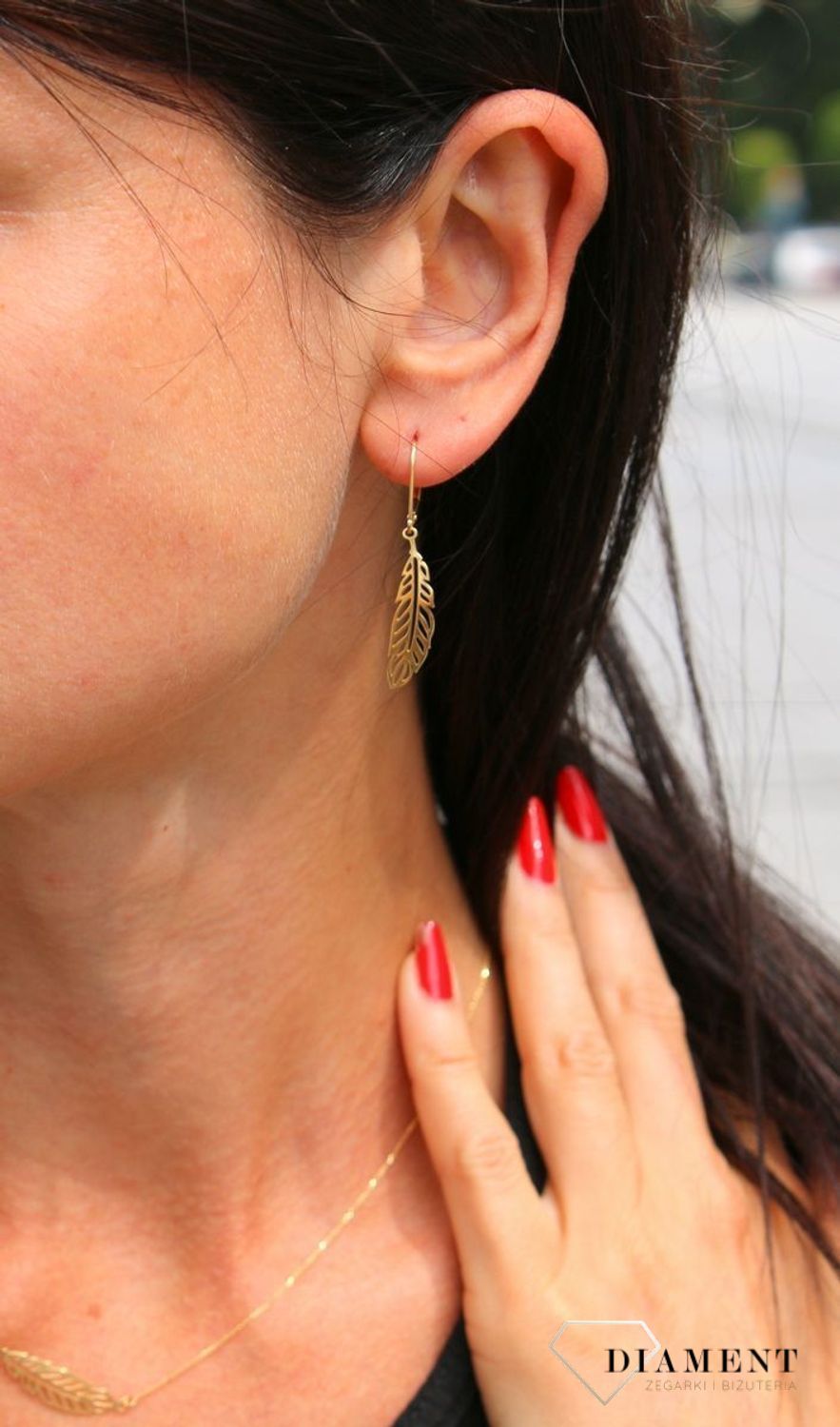 Kolczyki złote wiszące piórka. Kolczyki na biglu wykonane ze złota próby 0,333. Masa ok. 0,97 g.-001.webp