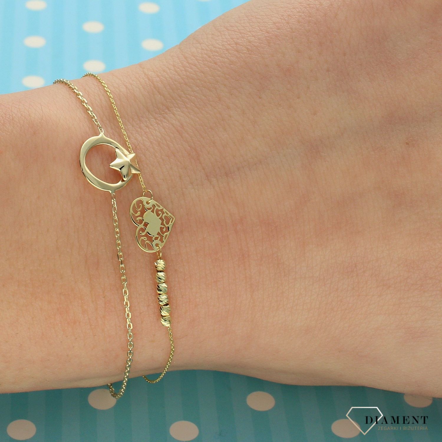 Złota bransoletka 333 koło z gwiazdką ZW-X-000-N18-DA18052. Złota bransoletka z kółkiem i gwiazdką. Bransoletka o bardzo delikatnym łańcuszku.jpg
