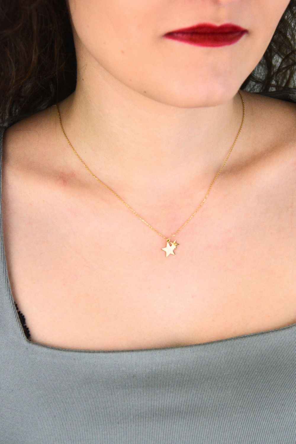 naszyjnik złoty celebrytka gwiazdka mała i duża.webp
