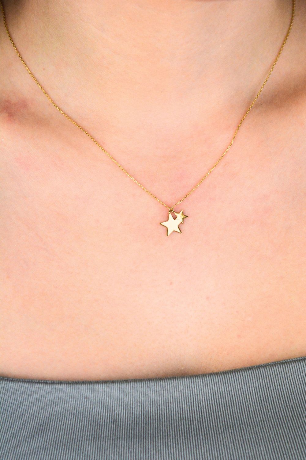naszyjnik złoty celebrytka gwiazdka mała i duża.webp