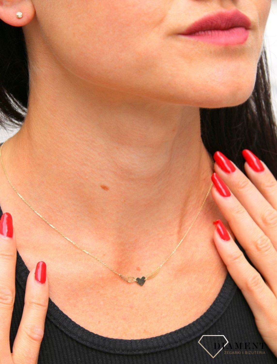 Naszyjnik złoty Yes ze skrzydełkami i serduszkiem to wyjątkowa biżuteria dla mamy i ukochanej osoby. Piękny prezent dla ulubienicy złota. Wymarzony prezent na rocznicę ślubu..webp