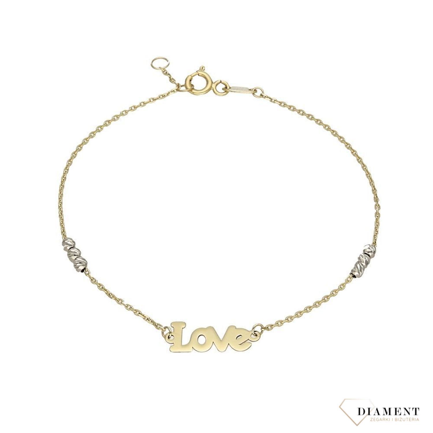 Złota bransoletka z napisem Love i kulkami z białego złota.jpg