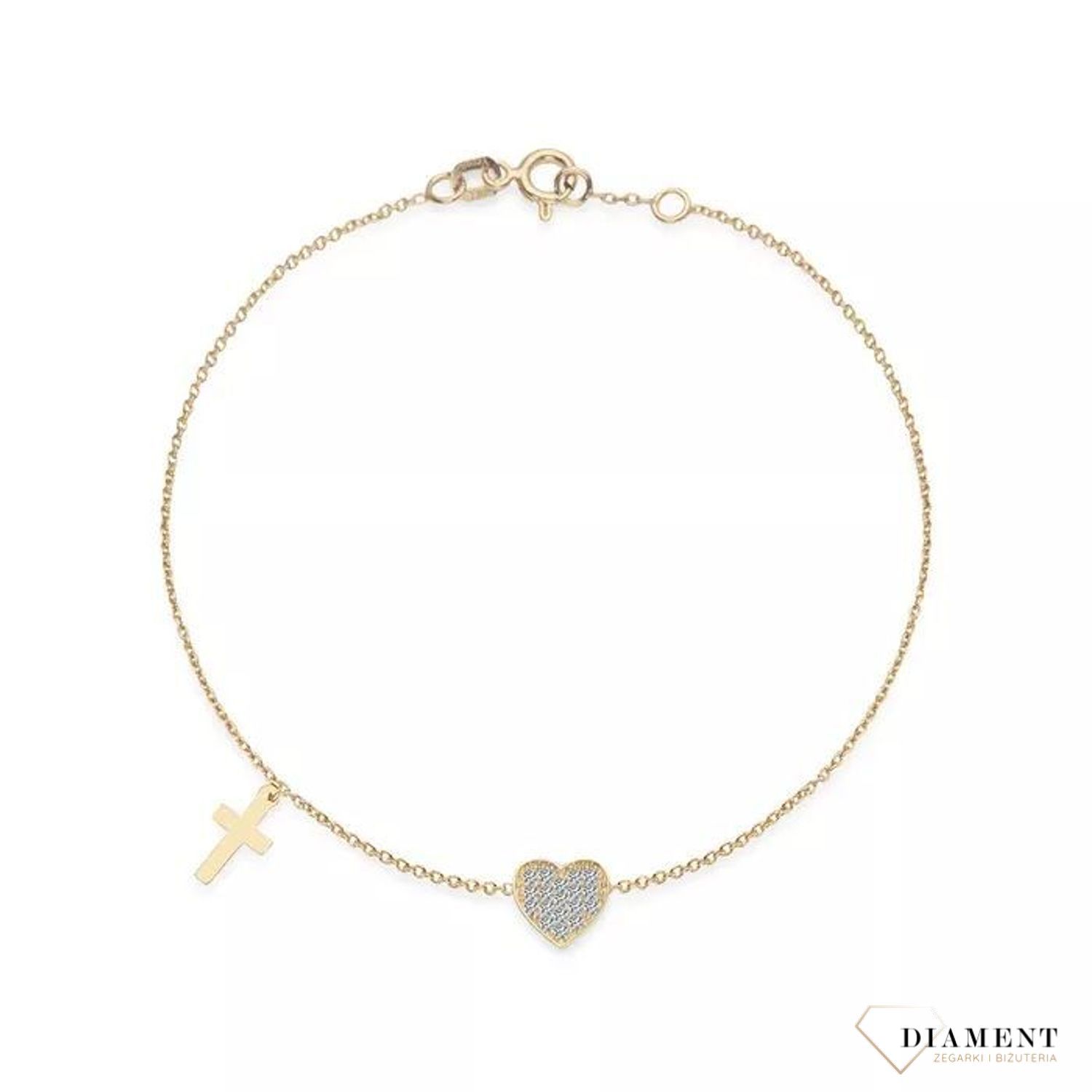Złota bransoletka celebrytka z ozdobnymi zawieszkami w formie serca i krzyżyka to wyjątkowa biżuteria inspirowana współczesnymi ikonami stylu..jpg