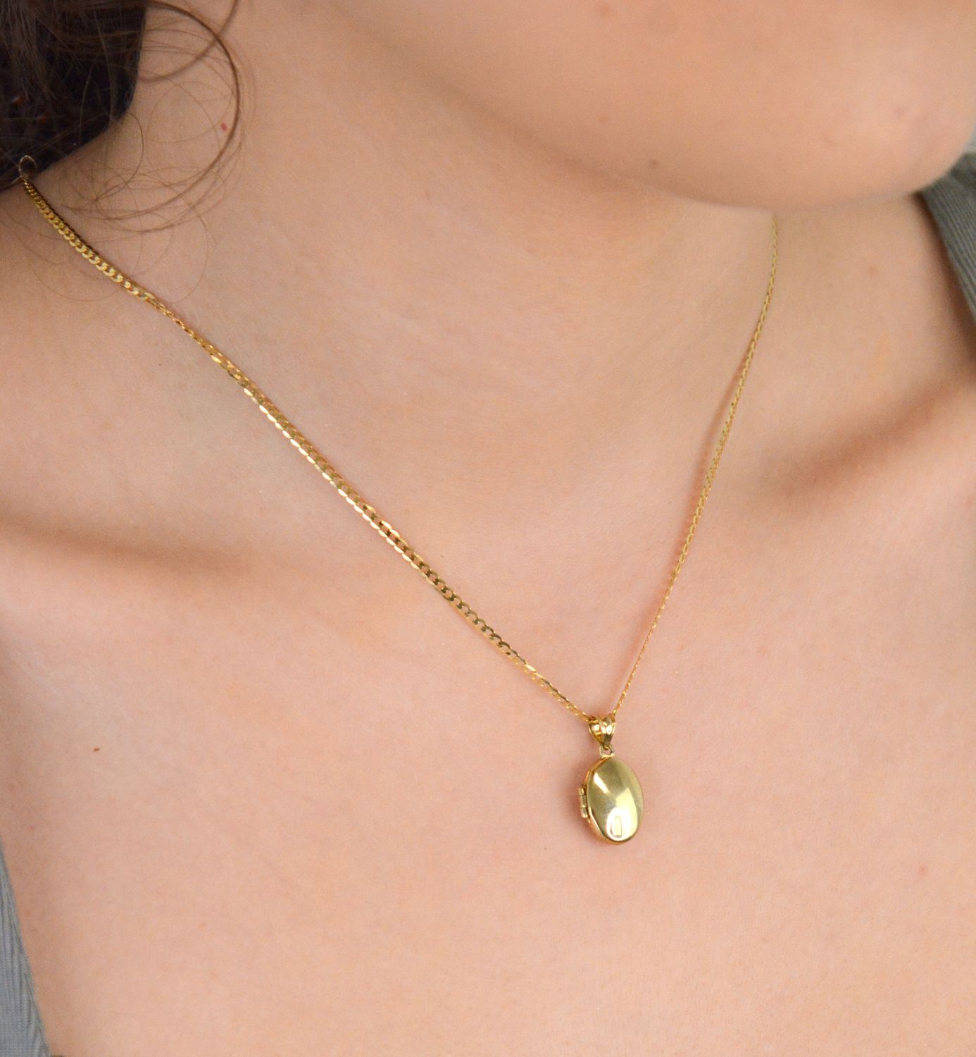 Złota zawieszka Otwierane puzderko złoto 333, ZW-X-X09-N00-LA17199. Delikatne zdobienia nadają mu wyjątkowy urok, a subtelny połysk złota podkreśla jego elegancję. Podaruj sobie lub komuś 1.jpg