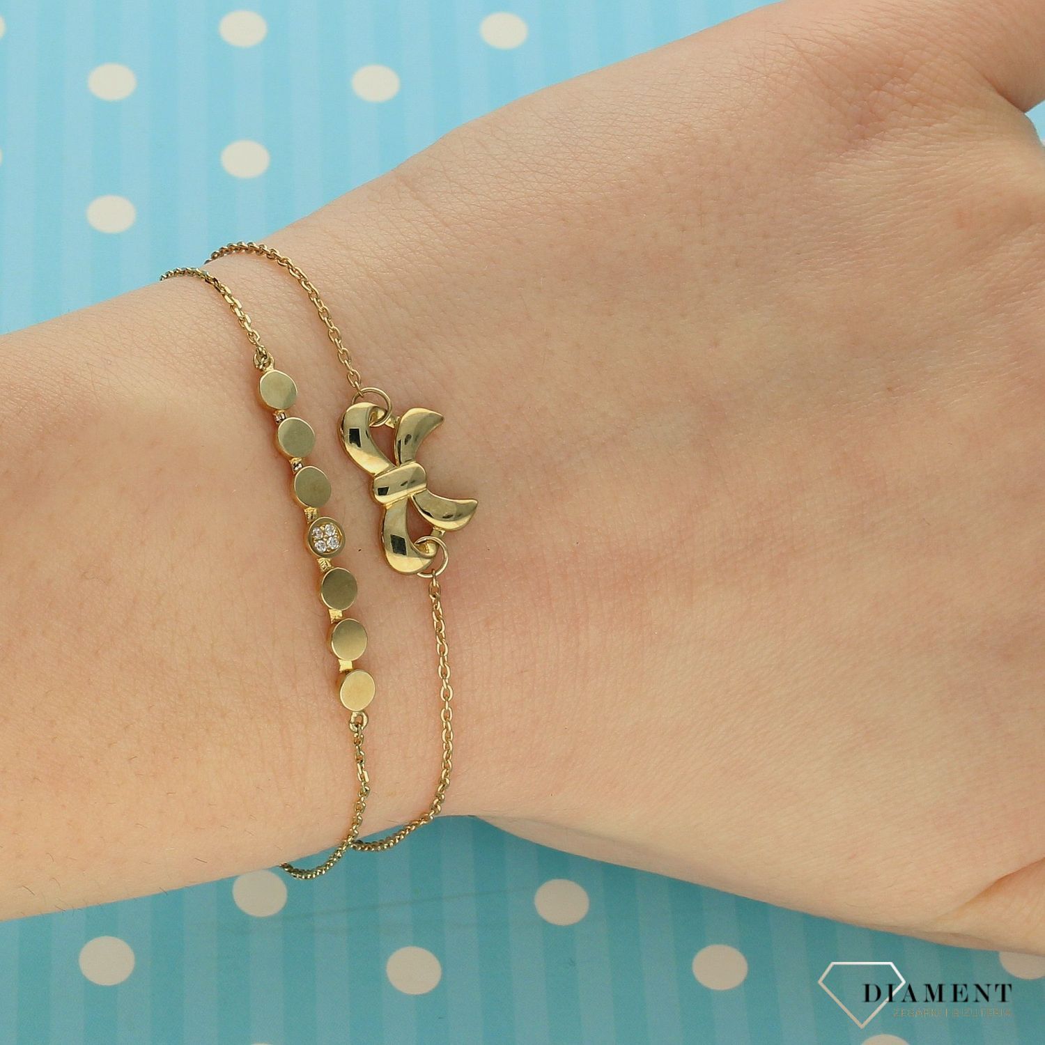 Złota bransoleta 333 z kokardką ZW-X-X09-N19-DA14045.jpg