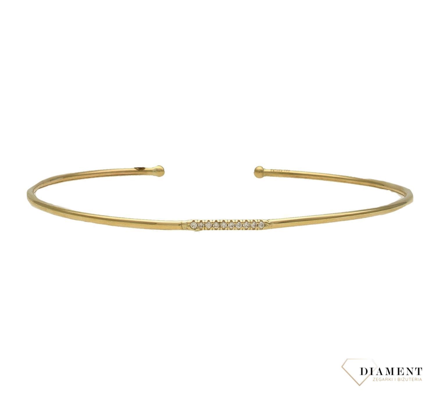 Złota bransoletka 333 sztywna z błyszczącymi cyrkoniami ZW-X-X09-N19-DB18232 (1).jpg