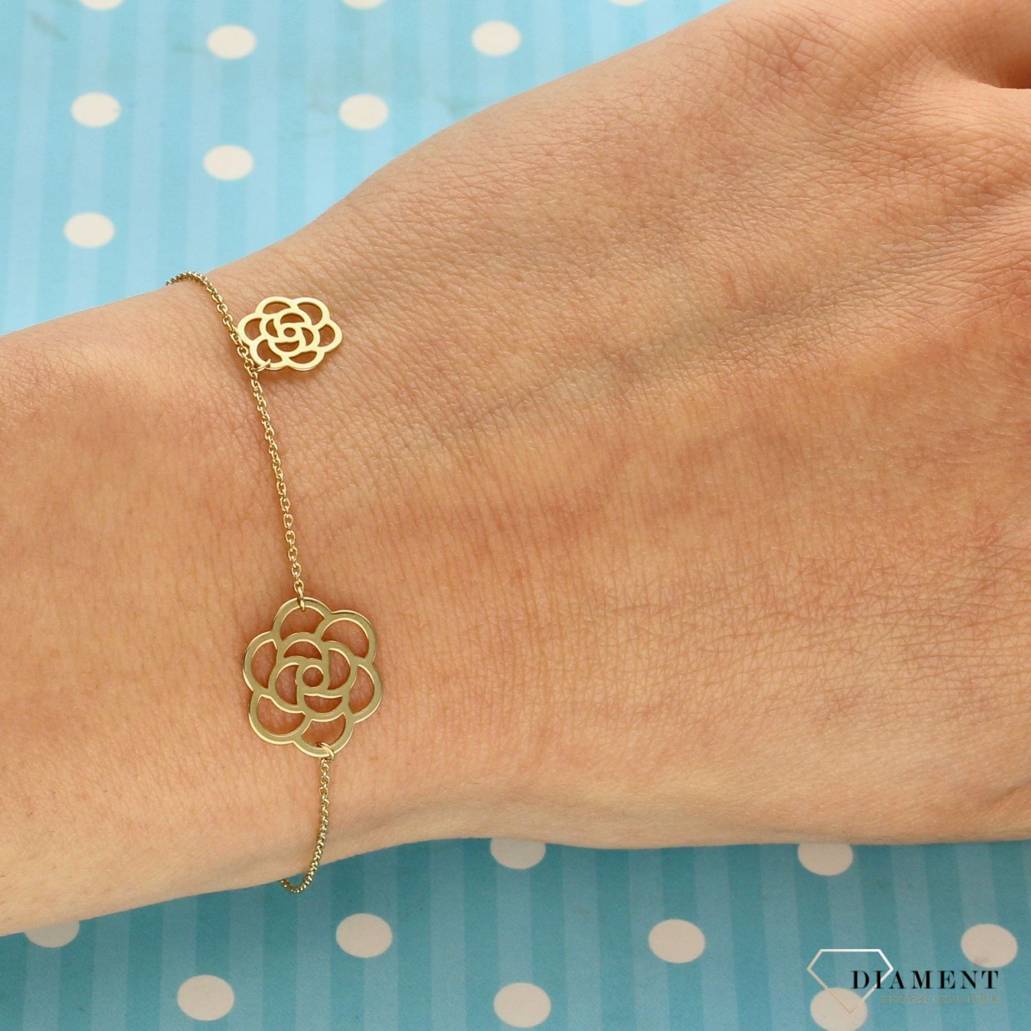 Bransoletka damska ze złota z ażurowymi kwiatkami ZW-Z-000-N18-DA17202 (1).jpg