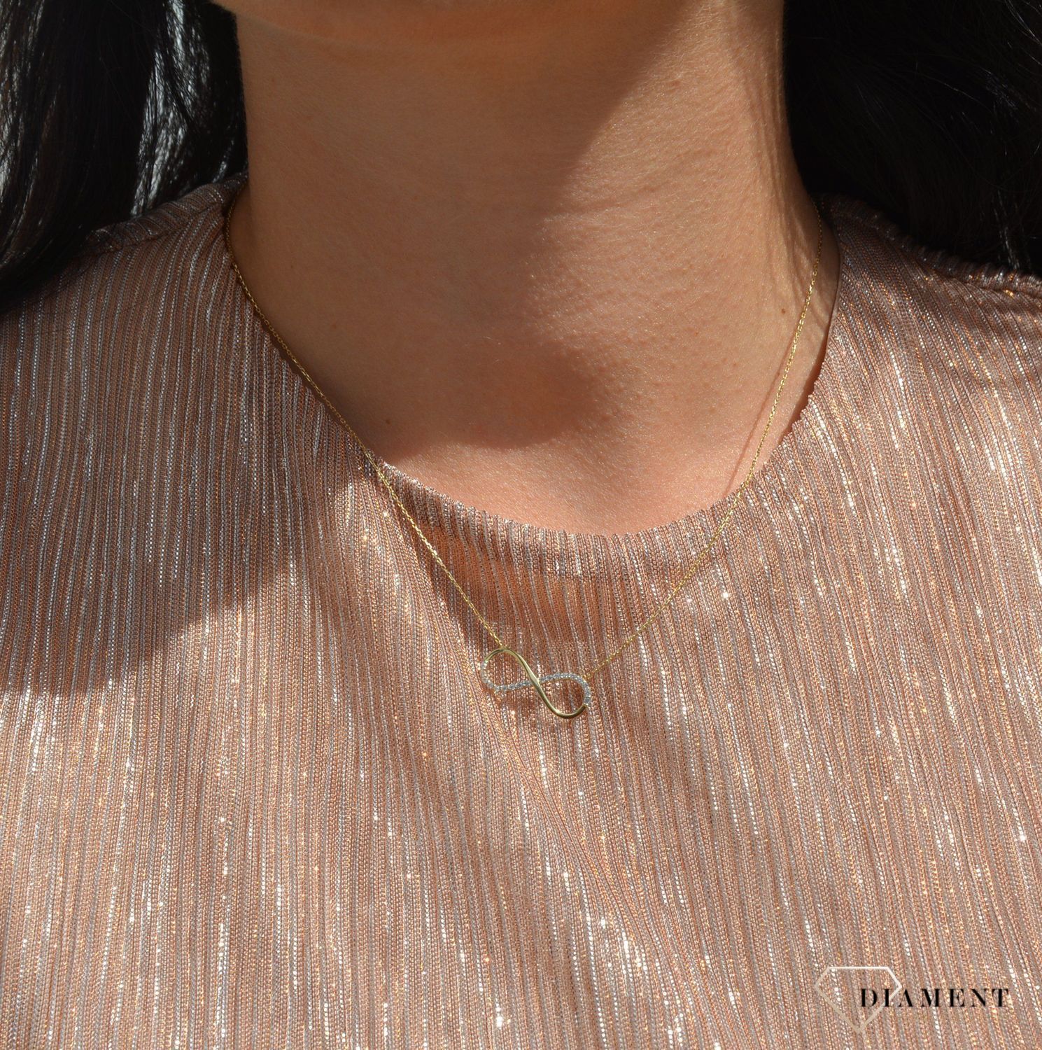 Złoty naszyjnik celebrytka 585 znak nieskończoności z cyrkonią.jpg