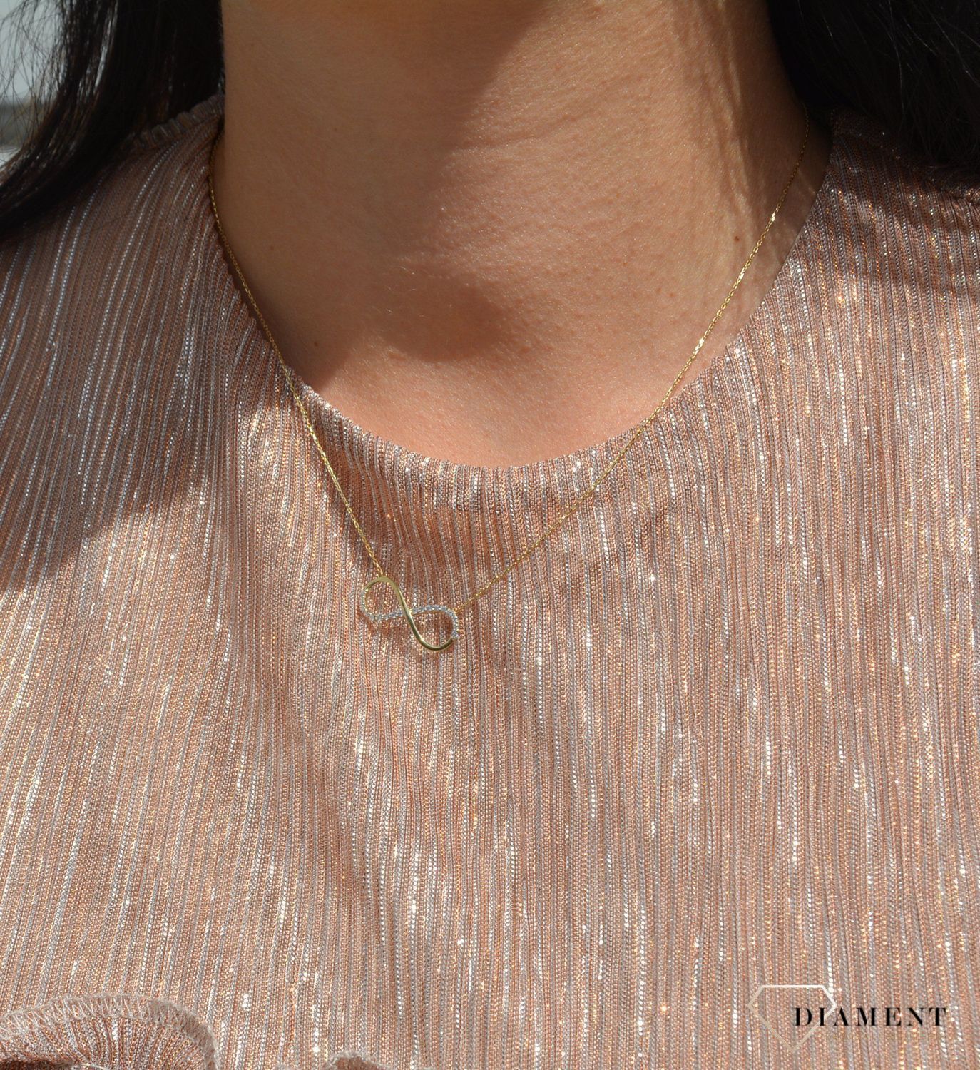 Złoty naszyjnik celebrytka 585 znak nieskończoności z cyrkonią.jpg