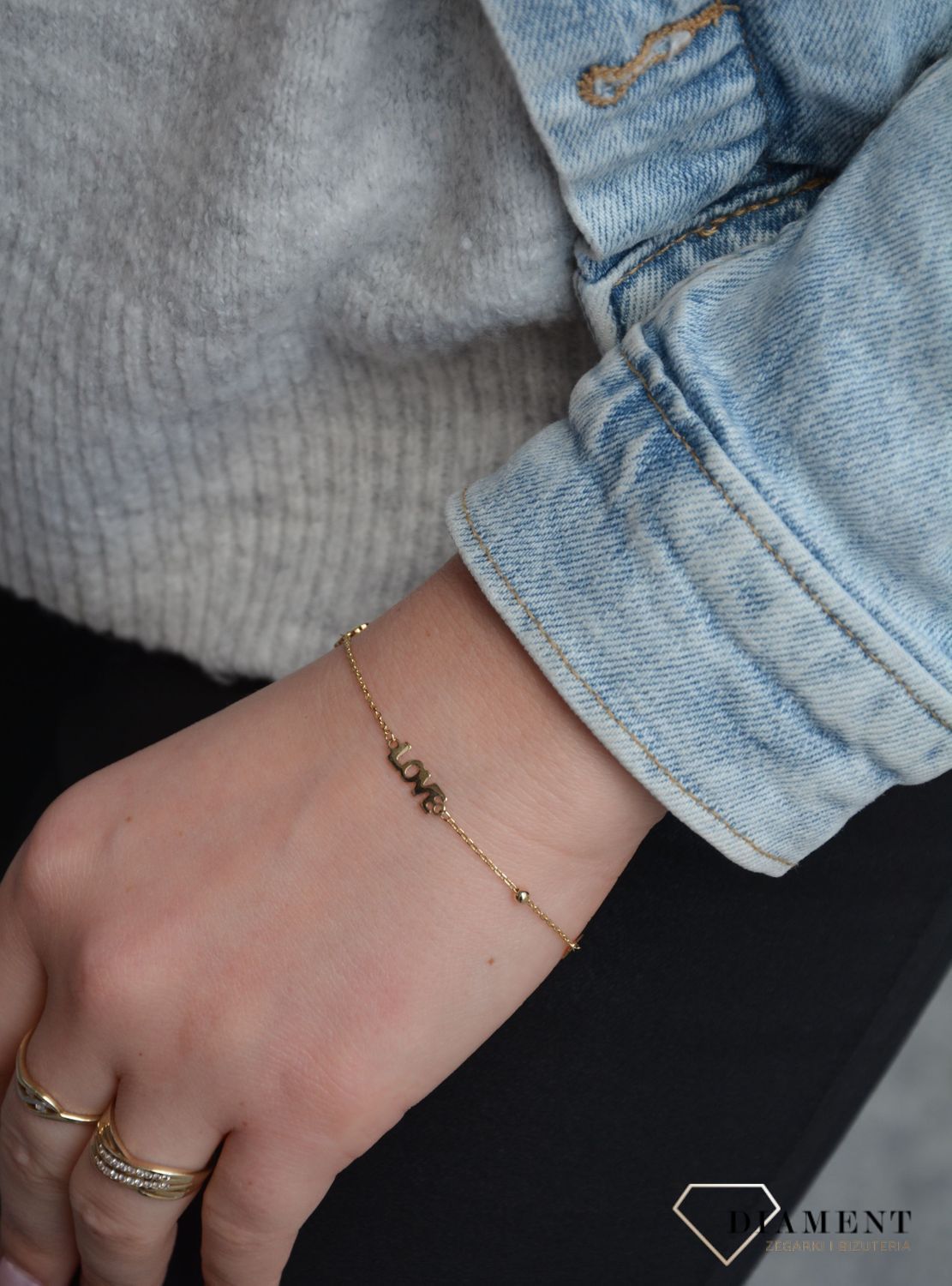 Piękna złota bransoletka celebrytka z miłosnym motywem to świetny pomysł na prezent dla ukochanej kobiety. Złota bransoletka wykonana z próby 585.  (1).jpg