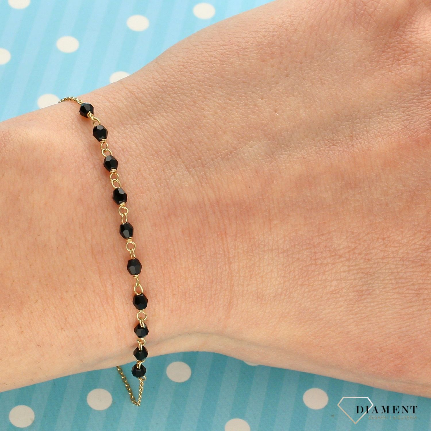 Złota bransoletka z fasetowanymi, koralikami w kolorze czarnym. Złota bransoletka różaniec. Zapięcie na karabińczyk. Złota bransoletka próba 585.  (1).jpg